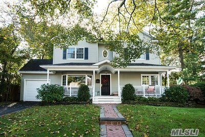 Beautiful Mid Block Colonial With Front Porch ! Expanded Kitchen With Viking Appliances.Gorgeous Wood Floors And Crown Molding Through Out The Home. Family Room Has A Cozy Wood Burning Fireplace. This Home Features Five Bedrooms And Three Full Baths. Peaceful And Large Yard Surrounded By Mature Trees For Privacy !