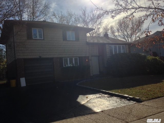 Newly Renovated Split Level Home On A Quiet Block. Roof Is 1 Year Old And Boiler Is 5 Years Old.  Ready To Move In.