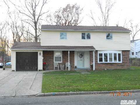 Just Bring Your Decorating. Large Split, Hardwood Under Carpets, New Windows,New Roof, New Cesspools,New Appliances, Updated Baths, Flat Usable Property, Close To Highways, Commack Schools
