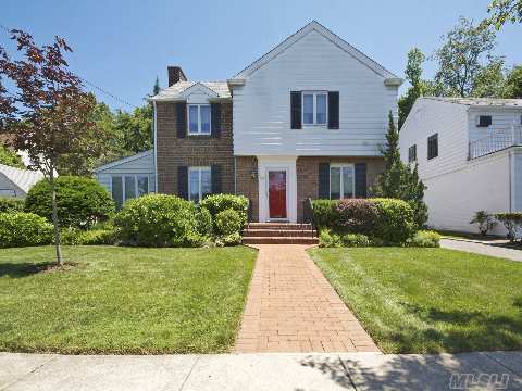 Immaculate Center Hall Colonial. This Home Boast L/R W-F/P Formal Dining Room,Den,Eik. Upstairs Is Mstr Bdrm, Mstr Bth,W-2Bdrm & And Bth. Perfect Manicured Prop. Bsmnt Is Part Fin. W/Office. Located Mid Blck On Beautiful Strt. Close To All!