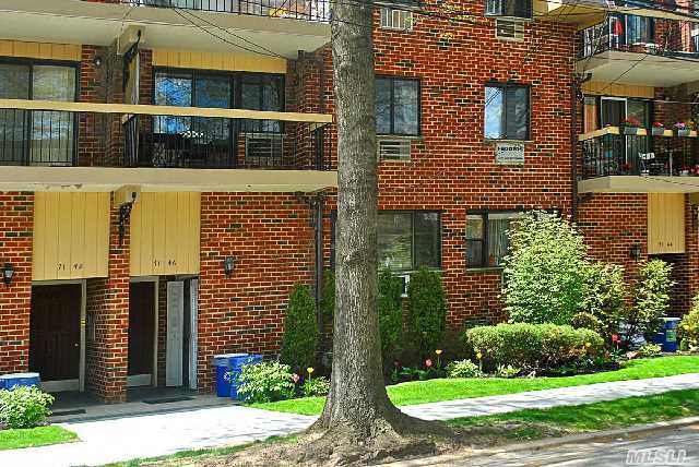 This Beautifully Renovated Condo Features Living Room,  Dining Room,  Renovated Kitchen,  3 Bedrooms & 2 Full Baths. Living Room Features Balcony,  Hardwood Floors Throughout & Washer/Dryer In The Unit. Indoor Garage Included In Unit. Close To Transportation,  Shopping,  Schools,  & House Of Worship.   P.S. 154 & I.S. 250