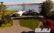 Enjoy Gorgeous Water Views Of Manhasset Bay From This Unique Waterfront All Renovated Contemporary Home Set On 1.3 Acre Of Landscaped Property W/Pool. Lrg Living Rm W/Fplce, Dining Rm, Lge Den W/Fplce, New Eik, 4 Bdrms, 3.5 New Baths . Full Fin Walk Out Bsmnt W/Entertainment Rm, Bdrm +Bth And Lots Of Storage. Excellent Setting For Family Living And Entertainment.