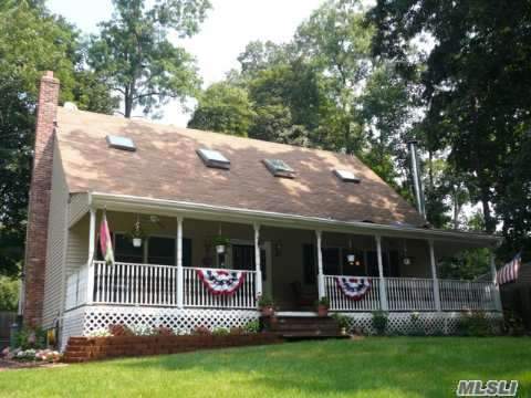 Beautifully Remodeled Colonial/Cape Feat: Lr W/Cath Ceiling, New Eik W/Maple Cabs, Hrdwd Flrs, 2 New Baths, Hi Hats, Ceiling Fans, 5 Skylights, New Andersen Windows, New Doors, Full Bsmt/Partially Finished W/Ose, 200 Amp Elec, Newer Heating Sys & Hwh, New Vinyl, Granny Porch, Picket Fance, Driveway On Nymph, Must See!