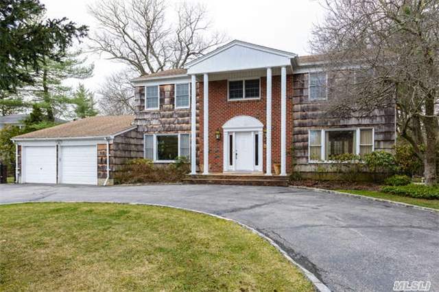 Jericho Schools-Perfectly Set 4 Bedroom Colonial With Large E.I.K., Den With Fireplace And In-Ground Pool In Private Setting.