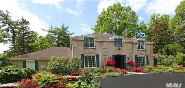 Stately Center Hall Colonial Set On Private Cul-De-Sac Surrounded By Multi-Million Dollar Estate Residences. Flat Usable Property In The Prestigious Jericho School District.
