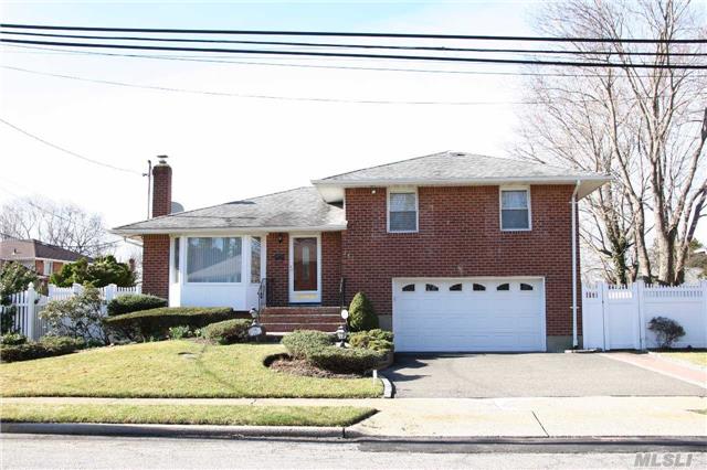 Fabulous Expanded Split In Prime Syosset Schools, Featuring New Maple Oversized Eat In Kitchen, All Hardwood Floors, Light And Bright, Updated Baths, New Brick Walkway, Igs, Fenced Property With Gunite Pool!