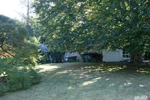 Premiere Location Is The Setting For This 3Br,  2Bth Ranch Style Home Set On 1.22 Acres Of Spectacular Flat Treed Property In A Choice Residential Community.   Roslyn School District.  Home Is Being Sold As Is.  Perfect For A Builder Or A User.  An Exceptional Opportunity To Create Your Dream Home.  Low Taxes.  Property Taxes Do Not Reflect Star Exemption Of $1, 217.05