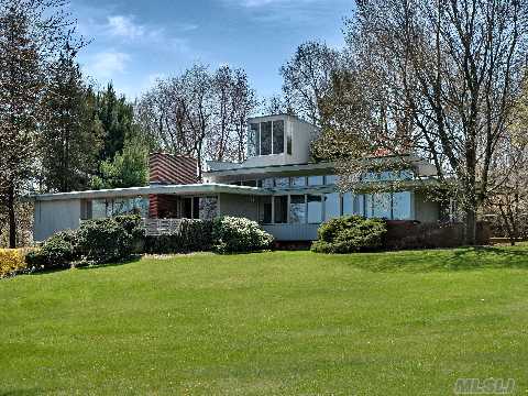 Superb Sands Point Value!  Unique Mid-Century Design At Its Best On 3+ Acres.  Brick-Floored Foyer & Adjoining Library, Dramatic Soaring Beamed Lr Ceiling Feat. Teak Fl, 4 Fireplaces & Studio. Dr Overlooking Broad Flagstone Terrace & Ig Pool W/ Vistas Of Sweeping Lawns & Specimen Trees. Master Bedroom/Bath W/ Dressing Area, Jacuzzi, Bidet & Heat Lamp. Observatory.