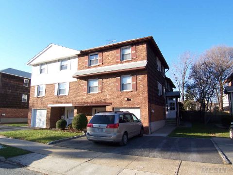 Southern Exposure! Highly Desirable & Spacious Duplex/Triplex. Updated Cac And Heating. 3,380Sf+ Living Space. Garage & 2-Car Driveway. Larger Lot, Private Yard & Deck. Prime, Quiet Location. Short Walk To Top-Rated S/D #26 Schools P.S. 203, Cardozo H.S. & Q27, 31 Buses. Vacant 2nd Flr Apt Ready To Generate Income!