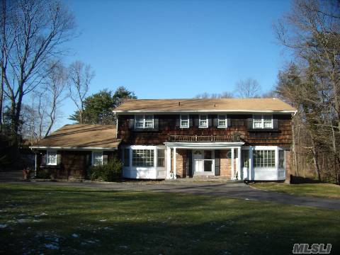 Mint Center Hall Colonial On Quiet Tree Lined Street In The Gates.  Newly Painted, Updated Baths, Den With Fireplace, Master With Bath And 2 Large Closets. Finished Basement. Home Sits On A Beautiful Acre !!