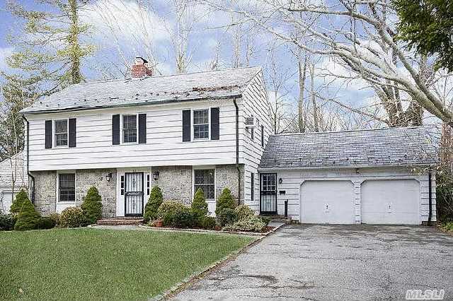 Classic Munsey Park Colonial With 3 Brs And 2.5 Baths,  Family Room,  2 Car Garage.  House Being Offered As Is