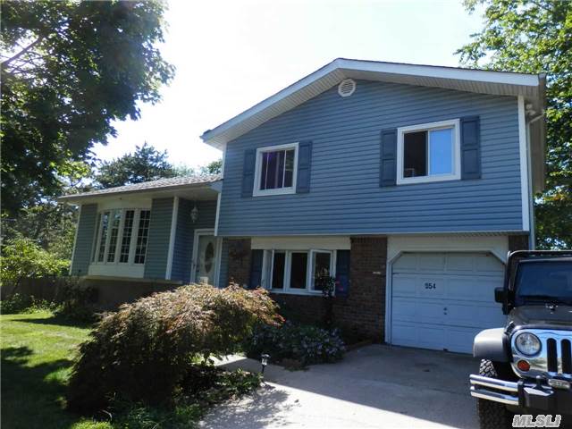 Bright And Sunny Updated Split With 16' X 36' Igp (2002). Kitchen Redone 2013 (Shaker Style Cabinets); **New Gas Heating** System 2005; Vinyl Siding 2010; Roof 2012; Solar Heated Pool; Finished Basement With Den And Full Bath; One Car Attached Garage; 24' X 13.5' Family Room; Hardwood Floors. All Cos In Place.