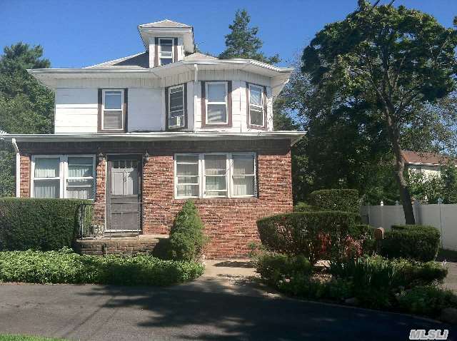 Legal Two Family. Rare Find In Syosset School District. Zoned Legal 2 When  Owner Occupied. Rental Apartment Covers Taxes. Roof,  Driveway,  Electric,  Oil Burner And Windows All Updated. 8'+ Ceilings,  Great Bay Windows, Pine Hardwood Floors,  Plaster Walls Throughout. Southern Exposure. 4 Ose,  Igs. Truly 2 Minutes To Train. Deep Wooded Private Property.