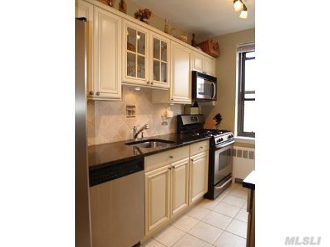 Top Floor Gem! Totally Renovated Oversized 2 Bedroom 1 Bath Apartment. Brite & Sunny With Glistening Hardwood Floors. All New Eik- Granite Countertops, Wood Cabinetry & Stainless Steel Appliances. Georgous New Bath. Situated In The Heart Of Town, Steps To Lirr, Shopping And Parks.