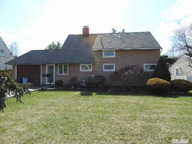 Just Move Right Into This Lovely Home Featuring Updated Kitchen,  Whole House Water Filtration System,  New Windows,  Living Room W/Pergo Floors,  Family Room/Garage,  Hi Hats,  Skylight,  2 Baths,  Separate Laundry/Boiler Room And Above Ground Oil Tank.  A Pleasure To Show!