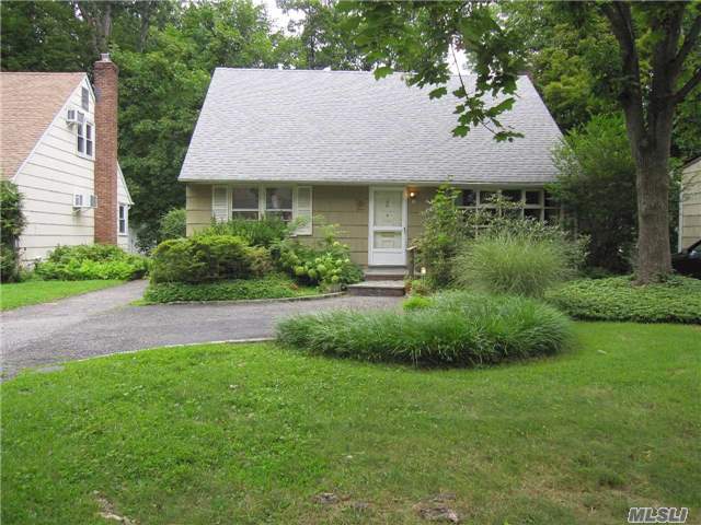 Bright & Spacious 4 Bedrooms, 2 Full Bath Cape With Full Basement, Family Room With Skylight And Fireplace, Central Air Conditioner, Newer Roof & Windows, Hardwood Floors, Large Private Backyard, Quiet Family-Friendly Block, Near Buses To Station, Easy Access To Northern Blvd And Major Highways.