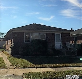 Lovely Detached Brick Ranch On Beautiful Street In Whitestone. First Floor Has Nice Hardwood Floors In Living Room/Dining Room. Eat In Kitchen, Full Bath, 3 Bedrooms, And Finished Basement With Bathroom. House Has Central A/C,  Spacious Backyard, And Private Driveway. Attic For Storage.