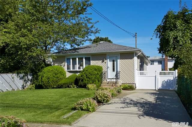 This A Beautifully Maintained Ranch On A Lovely Block With A Bay Window Overlooking The Well Manicured Lawn. Step Inside This Home And View The Wood Floors And Open Layout With An Eat-In-Kitchen. Central Air And A Large Finished Basement Great For Relaxation Or Entertaining Make This Home A Great Buy.