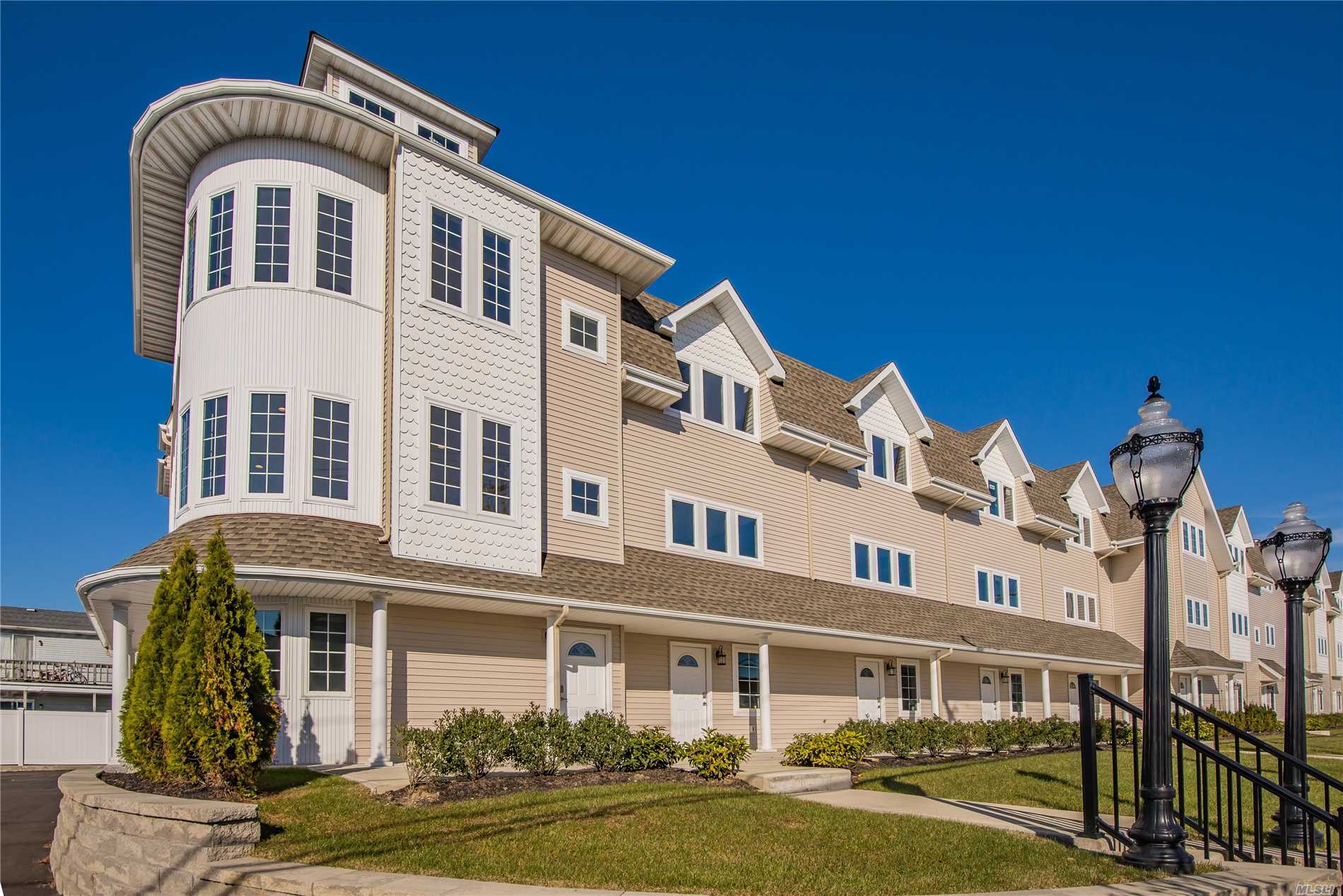 Brand New Gorgeous Townhouse (Unit #1) Features Fema-Compliant High Flr Elevation, 2 Bdrms, 2.5 Baths, 2-Car Gar, Entry Lvl Office/Den, Huge Wide-Open Main Lvl Living/Dining Rm Combo Next To Custom E-I-K W/Granite Ctops + Ss Appliances, Oak Flrs Throughout, & Prof Landscaping. Opportune Loc: Within Quiet Development Yet Close To The Mile, Marinas, Dining, Shops, Rr, +++!