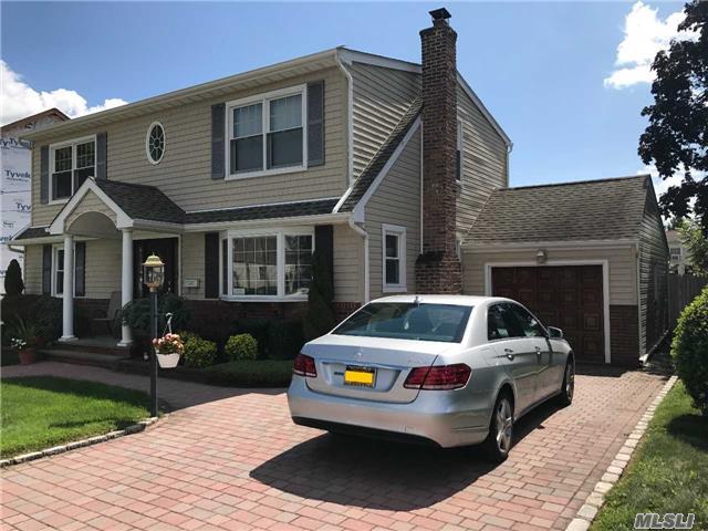 This Is A Nice Colonial, Ceramic Flr, Enclosed Porch. Fdr, Lr W/ Fplc, Kit W/Grnte Countertops, Cherry Wood Cabinets, Separate Eating Area , 1Br On 1st Fl. There Are 3Brs On 2nd Fl, 1 Bath. Extended Master Br W/2 Walk-In Closets. Cac, Basement Has Air Conditioning Unit. Oil Heat, Hw Consent, Wood Floors. Ig Sprinkler, Sentricon Termite System. Attached Garage, Updt Basement