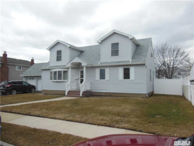 Beautiful Barnum Island Cape. This Home Offers Wood Floors Throughout 1st Floor. With A 2nd Floor Only 3 Years Young. Bright And Airy Feel With Sun Filled Living Room  2 Car Garage And A Large Yard With Jacuzzi. Close To Tofhemp Shell Creek Park Lirr And Lincoln Orens Middle School.  Make This Home Your Home!!!!