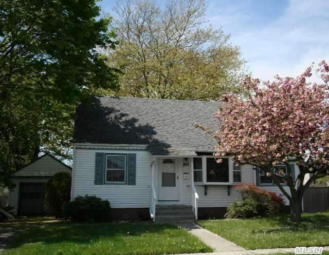 Lovely Cape Located In The Village Of Lindenhurst. 4 Bedrooms,  2 Full Baths,  Full Basement.