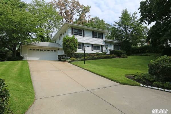 Bright, Sunny, Sprawling Split Level Home. Offers Large Living Room With Fireplace, Formal Dining Room, Eat-In Kitchen, 5 Bedrooms, 3.5 Bath & Family Room In The Desired Village Of Flower Hill. Close To Long Island Rail Road & Schools!