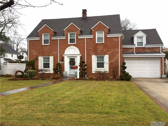 This Is A Beautiful Center Hall Colonial On A Large Lot. It Has An Eik W/ Brf Nook, Fdr & Lr Each W/ Spectacular Built-Ins, Lr Also Has Wood-Burning Fp, Mbr W/ Ensuite + 3 Large Bdrs, Finished Basement W/ High Ceilings And Recessed Lighting, & Another Wood-Burning Fp, A Sunroom, Patio, Over-Sized Backyard, 1.5 Garage W/ Pvt Driveway That Will Fit 3 Cars.