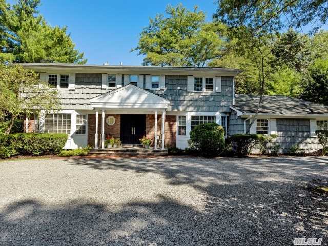 Beautiful 5 Bedrm 3.5 Bth Ch Colonial In The Prestigious Gates Of Woodbury. Wood Flrs,  Flr,  Fdr,  Fam Rm W/Fp. Updated Eik With Sliders To Deck,  Laundry Rm,  Pantry. Large Sized Bdrms,  Upstairs Full Bth Redone W/Jacuzzi Tub,  Spacious Mstr Bdrm Suite W/ Walk-In Closets.1 Flat Acre Of Resort-Like Property,  Features Brick Patio,  Trex Deck,  Ig/ Htd/ Gun Pool & Tennis. Syosset Sd