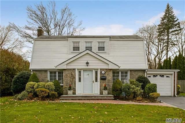 Spectacular Center Hall Colonial. Designer Decor! All New Kitchen And Baths. Living Room Opens To Double Size Den. Dining Room Opens To Brand New Kitchen. Finished Basement. 3 Bedrooms 2.5 Baths. Beautiful Hardwood Floors Thru Out. This Totally Renovated Home Is Set On Park Like Property. Taxes Have Been Grieved For 2018-2019.