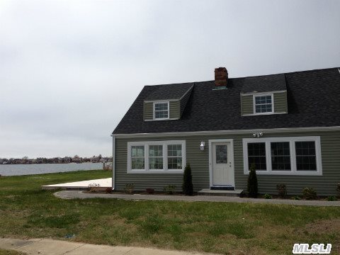 Beautiful Waterfront Property,  Completely Renovated 5 Bedroom Cape With Amazing Views Of The Great South Bay. This Open Floor Plan Has A Center Island Kit. With Granite And Stainless Steel Appliance. Open Great Room With Fireplace And Great Views,  60 Ft. Bulkhead...Don't Miss This One! Motivated Seller.