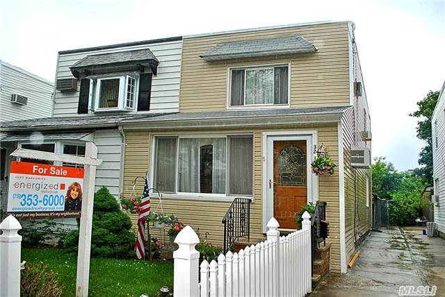 Look No Further For Your Next Home! Sun Soaked Semi-Detached Colonial In Prime Bayside Location! Features Living Room, Formal Dining Room, 2 Full Bathrooms, And A Finished Basement! Updated Siding! Close To Transportation, Shopping, House Of Worship. P.S. 159 & I.S. 25.