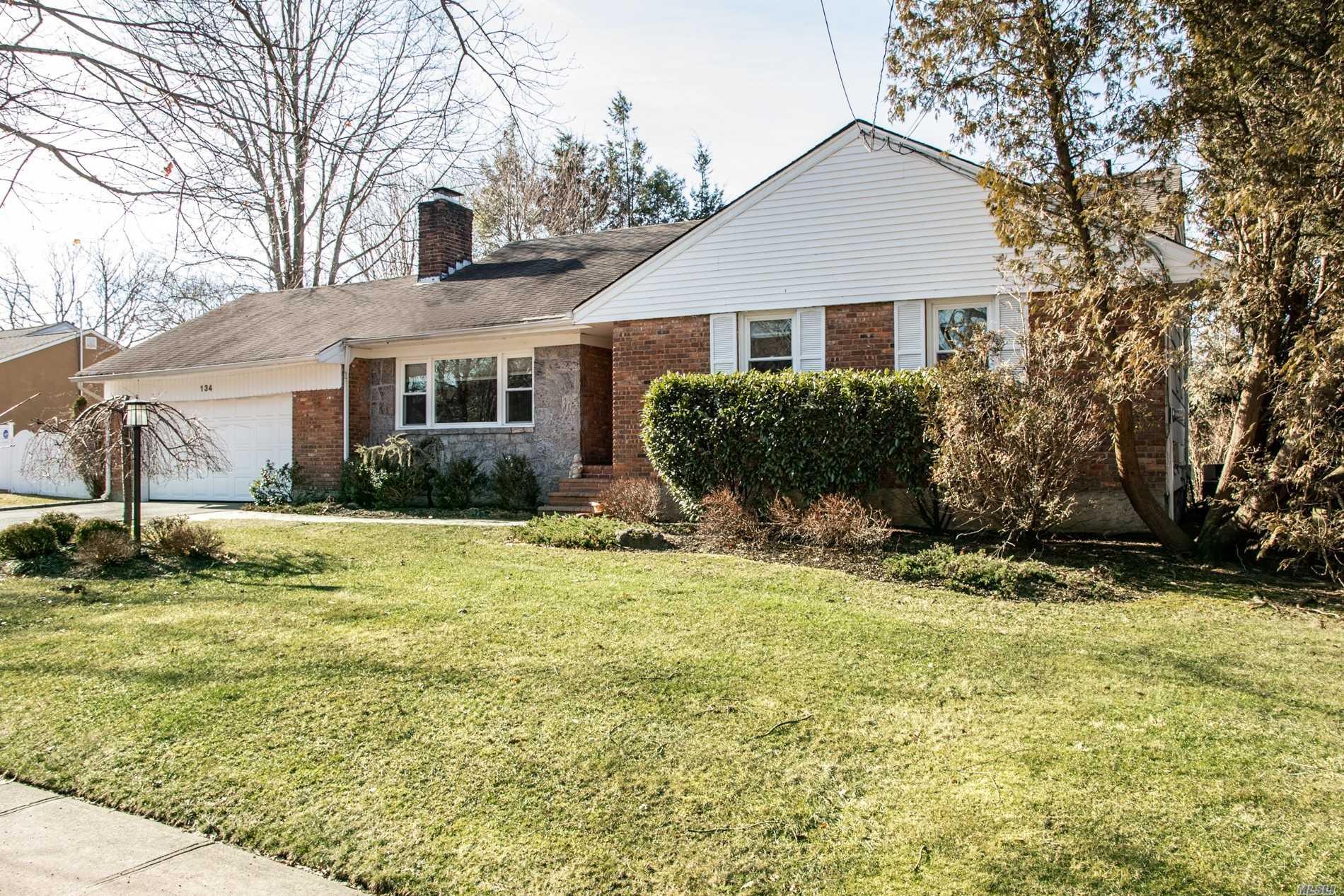 Reduced for Quick Sale! Exquiste, Warm & Sunny N. Syosset Home.Entry Opens To All Living Areas.Pristine Home Boasts Wd Flrs, Crown Moldings, Built Ins, Desi Kit W/White Cabs, Gran & High Quality Appls. 3Brs On The Main Level, Master W/Full Marble Bath, An Add&rsquo;l Bath W/Stone & Quartz. Decorator Dr & Lr W/Wd Burning Frplc. Lower Level Has Office, Lge Den, Sep Rm, Fbth, Util Rm& Laund. 2 Zn Cac, Igs, Prof Landsc.Updates Include Paver Patio, & 2 Car Garage. Near Lirr And Shopping.