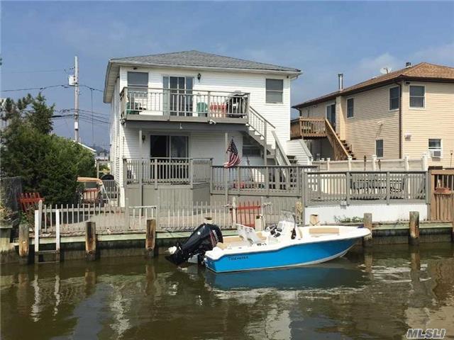 This Waterfront Property Features Great Views And Easy Access To The Bay. High And Dry Contemporary Four Bedrms, Two Baths, Cathedral Ceiling, 3 Skylites, Hi Hats, Ceramic Bath, Rear Deck And Patio. Possible M/D W/Proper Permits.