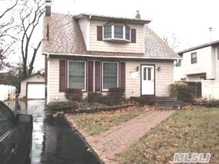 This Beautiful Colonial Mid-Block On A Tree-Lined Street Features, A New Kitchen With Granite Counters And Stainless Steel Appliances, Front Enclosed Heated Porch, Gleaming Hardwood Floors, Livingroom With Fireplace, Sliding Doors To Deck And Pool, Finished Basement And Much More. Possible M/D With Proper Premits.