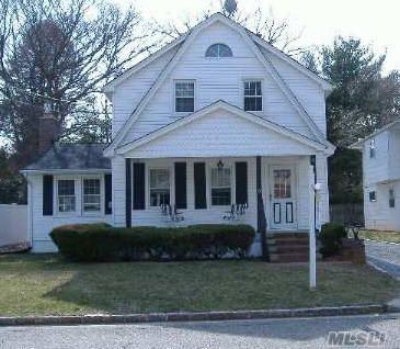 Colonial With Syosset School,Corian Counter Tops, Built In Hutch In Living Rm And Dining Room. 