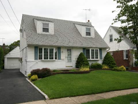 Mineola Lawns --Wonderful Cape, 4 Bedrooms, 2 Full Baths - 52 X 100 Property, Large Basement Must See!