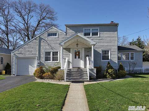 Lovely Colonial In The Heart Of Massapequa - Walking Distance To Lirr, Great Neighborhood W Fabulous Schools. Terrific Kitchen Just Updated Last Year With Stainless Steel Aplliances And Granite Ct's.  Hw Floors, Roof 4 Yrs Young, 220 Electrical - Newer Vinyl Siding