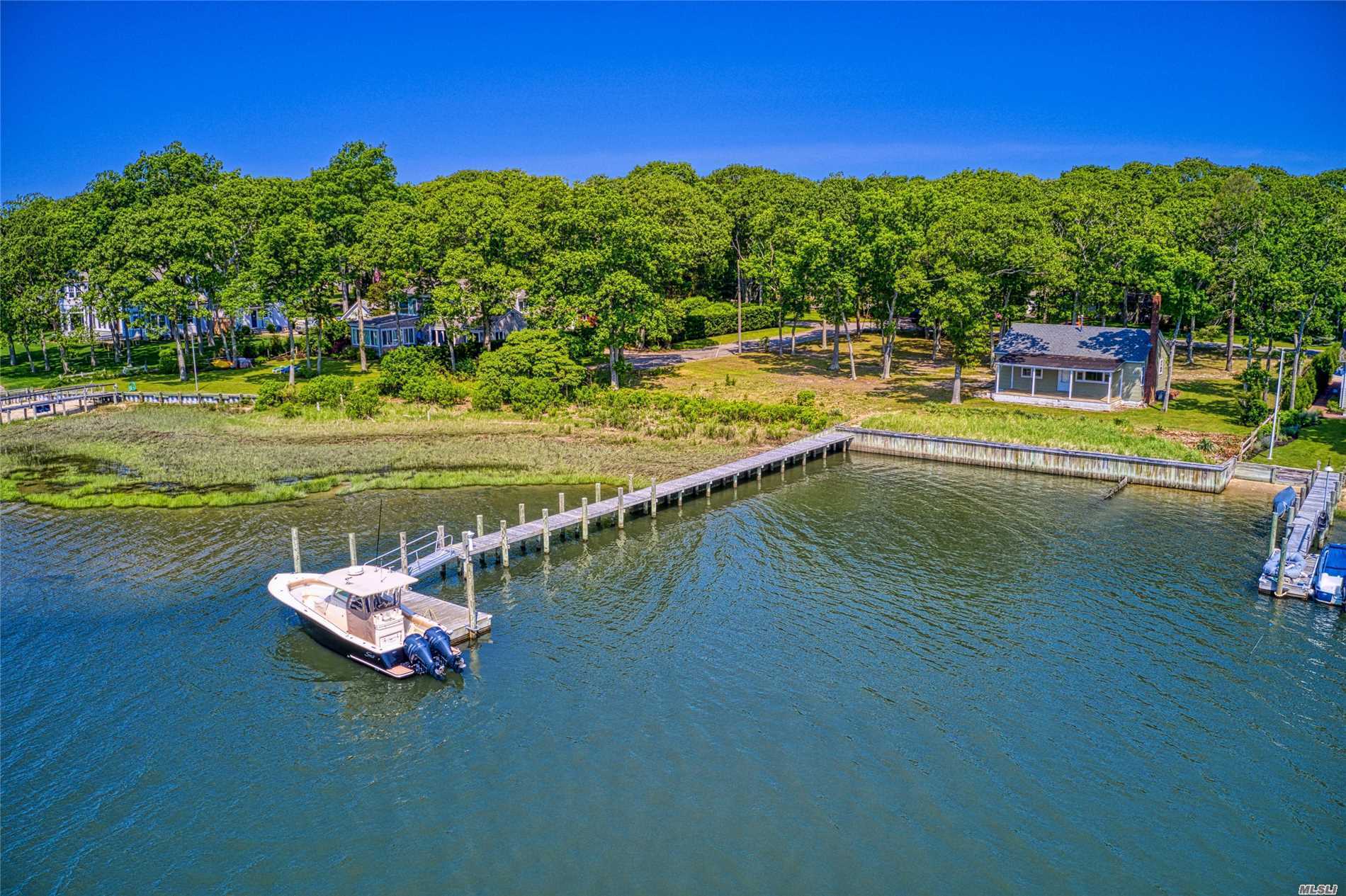 One of the last double lots on Broadwater&rsquo;s Cove. Big water view. Paradise awaits you in Cutchogue, NY&rsquo;s sunniest village at this pristine cottage w/160&rsquo; waterfrontage. The bright & airy 2-bedroom home features a wood burning fireplace, ideal for cozy nights, as well as a bulkhead and new dock. The premier Broadwater&rsquo;s Cove Ass&rsquo;n w/ boating access to the Peconic Bay & beyond is a coveted spot by Nassau Point causeway beach. Enjoy this season at the cottage while planning dream home.