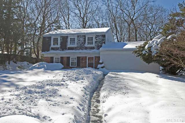 Comfortable Colonial Offers 3 Br,  3.5 Bths With Studio. Den W/Fplc Or Perfect For Home Office W/Side Entrance. Private .52 Acre. Oak Floors,  Central Air,  In Ground Sprinklers. Great Buy In Three Village! New Baths,  Floors In Bedrooms- A Must See- Taxes Are Being Grieved