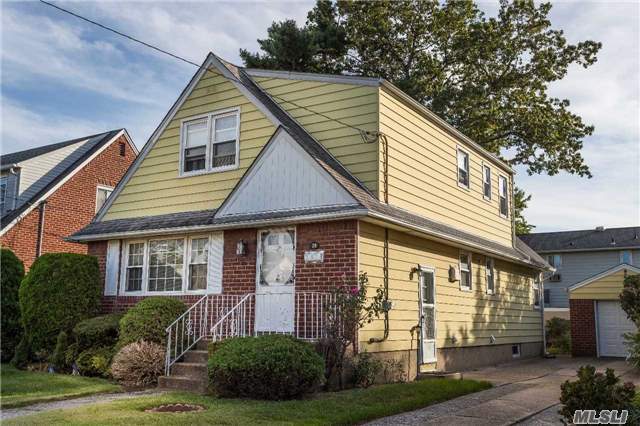 Great Cape Cod On Tree Line Street, Spacious Living Room, Beautiful Formal Dining Room, Great Eat In Kitchen, Full Finished Basement, Den/Family Room, Close To All. Great Schools, Parks, Library And More. 10 Min To Queens, 25 Min To Brooklyn, 30 Min To City (Lirr)