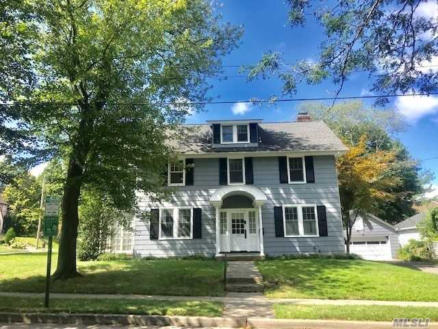 Manhasset Village -4 Bedrooms, 1.5 Bath Village Colonial on .23 of an Acre, Eat-In-Kitchen, Formal Dining Room, Den, Staircase to 3rd Floor Finished Storage, Close to Town.