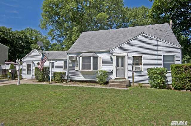 Expanded Cape With 4 Brs,  2 Baths,  Den W/Fireplace,  Lr W/Fireplace,  Eik,  Screened Porch,  Half Acre Of Park Like Property Full Part Fin Basement. Award Winning Bay Shore Schools.