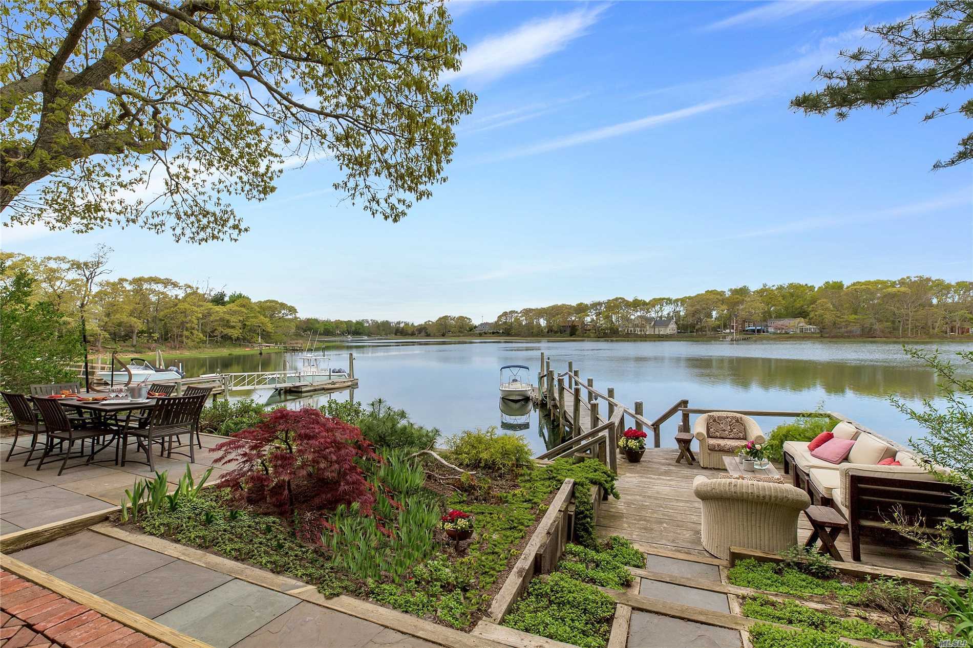 New To The Market - Premier Showing. It Doesn&rsquo;t Get Any Better! Waterfront, Dock, Wide Open Views, Beautiful Designer Gardens, 3/4 Bedrooms, 2 Baths, Great Room, Cottage /Garage. Private And Extra Special!