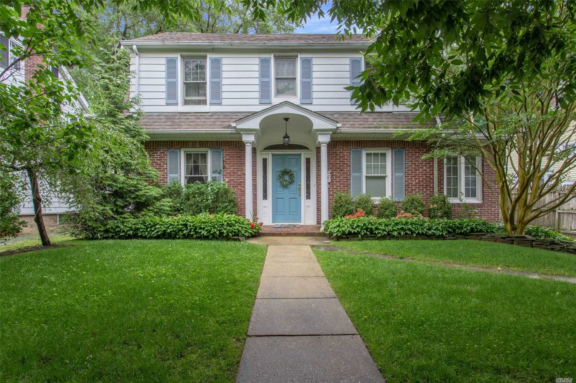 Charming 3 Bedroom, 2 Bath Colonial In The Heart Of Oyster Bay Boasting An Updated Kitchen w/ Stainless Steel Appliances And Granite Counters. Living Room, Dining Room, Den With Wood Floors Throughout. Finished Basement, 2 Car Detached Garage And Paver Patio On A Lovely Tree Lined Street Close To The Village, LIRR & Houses of Worship. Must See!