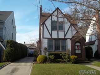 Outstanding Diamond Bright Light Tudor Home With Large Gracious Rooms, Beautiful Architectural Detail.Finest Quality Materials.Totally And Magnificently Renovated. All Anderson New Windows,New Corian Bright Eik W/Gas Cooking. Slide Out To Deck And Yard.,Gas System. Mature Private Evergreens.