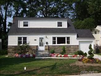 Better Than New! Top To Bottom Completely Remodeled Home In The Roslyn School District.  Perfect For Entertaining, Formal Dining Room.  Granite Countertops And Stainless Steel Appliances In The Gourment Eat-In-Kitchen.  Sliding Glass Doors To Deck From Living Room With Fireplace. Full Finished Party Basement.