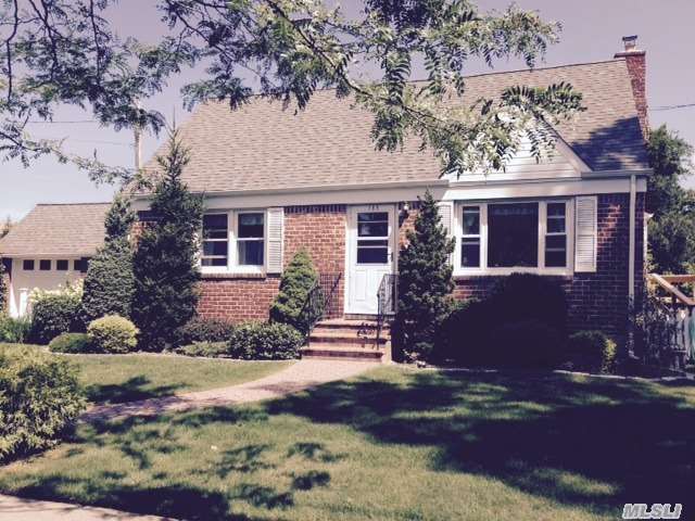 8 Room 4 Br Brick Cape With Breezeway, Garage And Rear Den.Walk To Lirr, Stores, Schools . Last House Before Park.