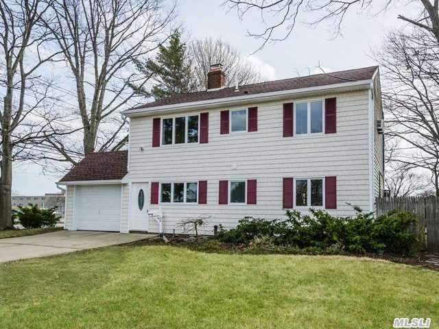 Totally Renovated Colonial On Oversized Property. Custom Built Eat In Kit W/Cherrywood Cabinets,  Granite Counters & Ss Appliances. Updates Include Roof,  Siding,  Elec,  Above Ground Oil Tank,  Baths,  Windows,  Wood Floors And Much More! Updated Boiler Relocated To Garage. Taxes Do Not Reflect Star Savings Of $937. Call Today For A Private Showing.