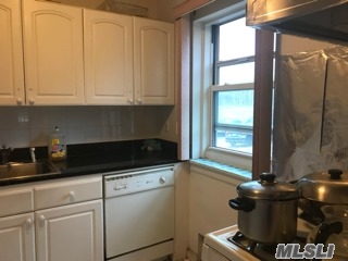 Corner 2 Br Co-Op Including 2 Parking Space In Downtown Flushing. Convenient To E/F Train, Qm4, Express Bus To Manhattan And More.